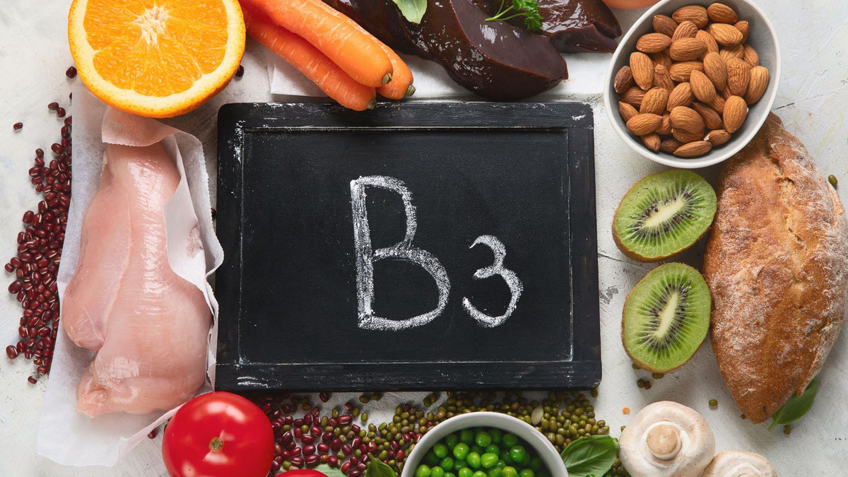 Vitamin B3 Niacinamide on table with foods that include it