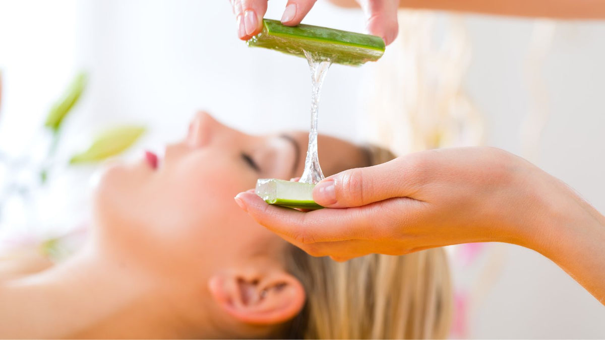 a woman getting an aloe facial 