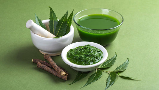 Neem leaves, juice and paste with a pestle and morter 