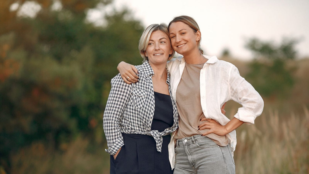 two women posing for the camera together