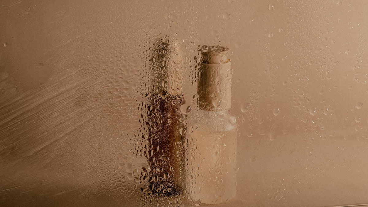skincare behind a wet shower door