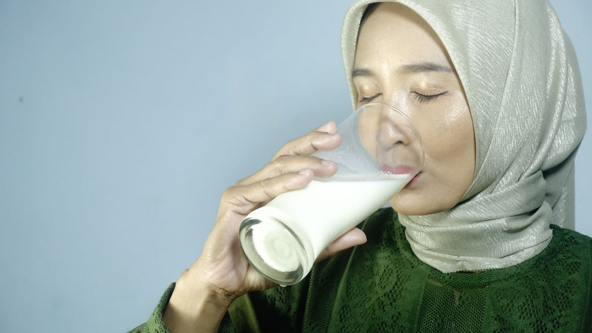 woman drinking milk