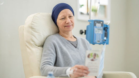 woman reading during a chemo infusion