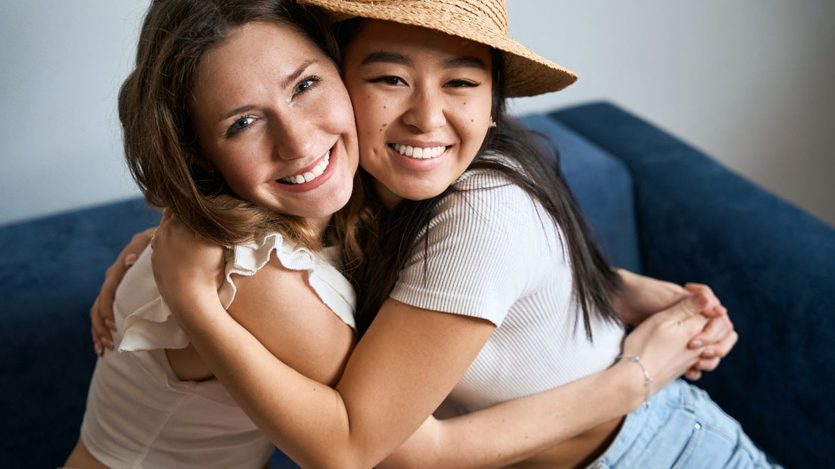 two friends hugging 