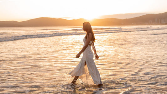 woman walking into salt water