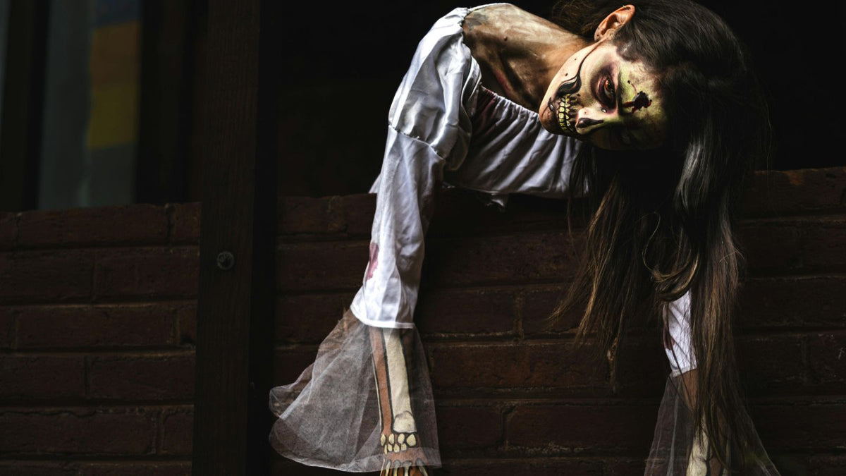 woman dressed as a zombie